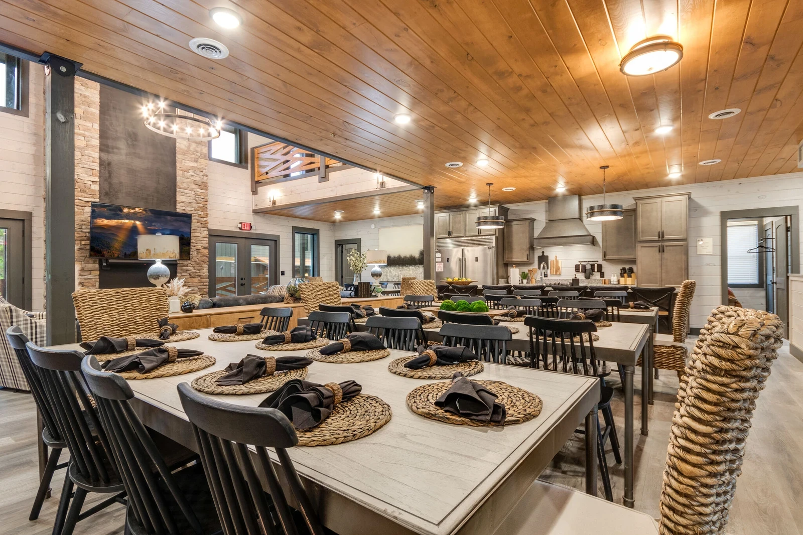 spacious dining area with three tables